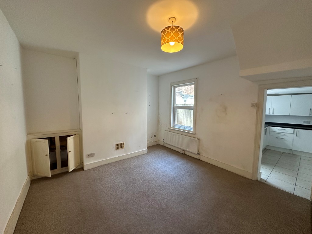 Lot: 114 - TWO-BEDROOM TERRACE HOUSE FOR IMPROVEMENT - Dining Room with access into kitchen
